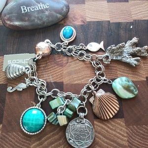 Chicos NWT slide on charm bracelet .